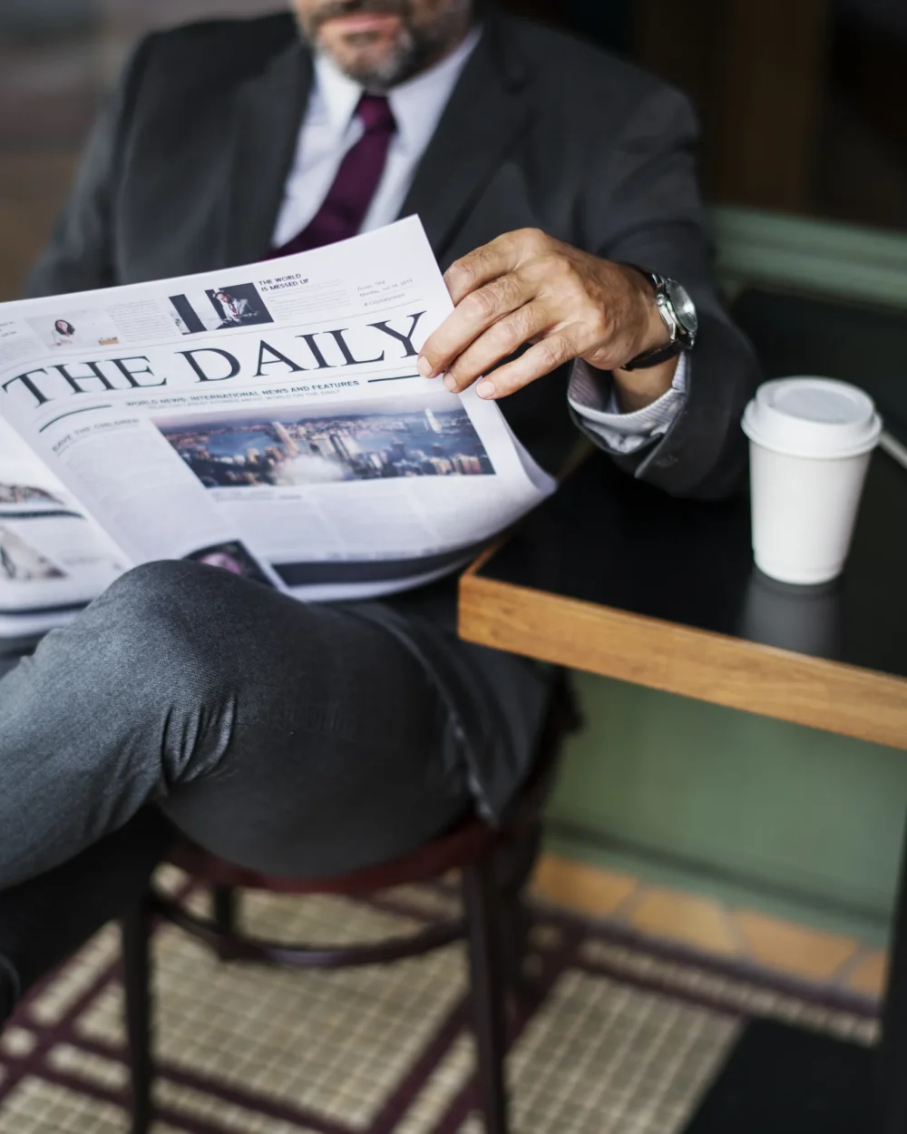 businessman-reading-daily-news