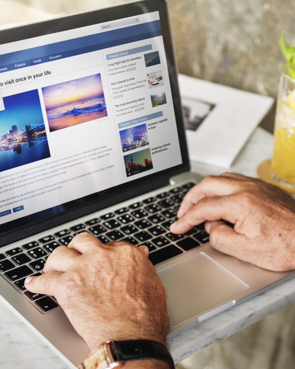 Elderly man is using computer laptop